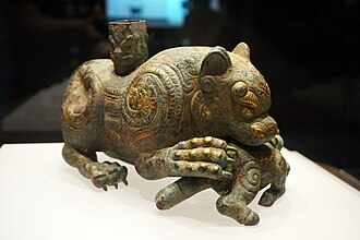 Brončani kip tigra u lovu, Razdoblje proljeća i jeseni